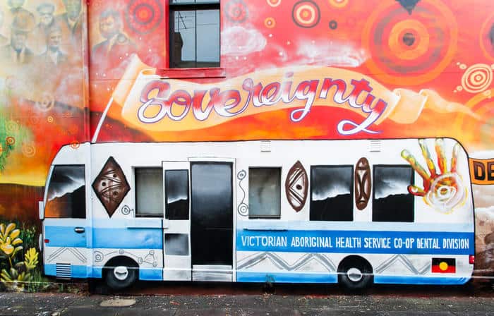 Charcoal Lane mural in Melbourne’s Gertrude Street, Fitzroy by Gunnai Waradgerie artist Robert Young.