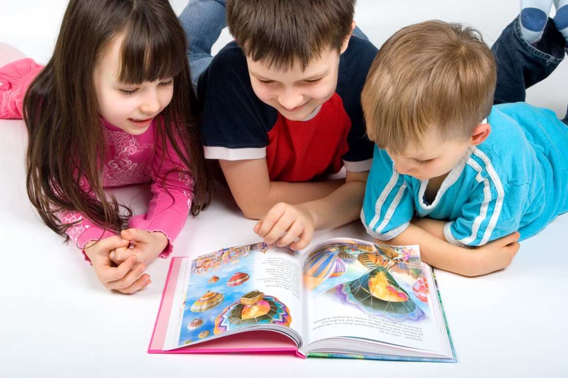Children reading books.