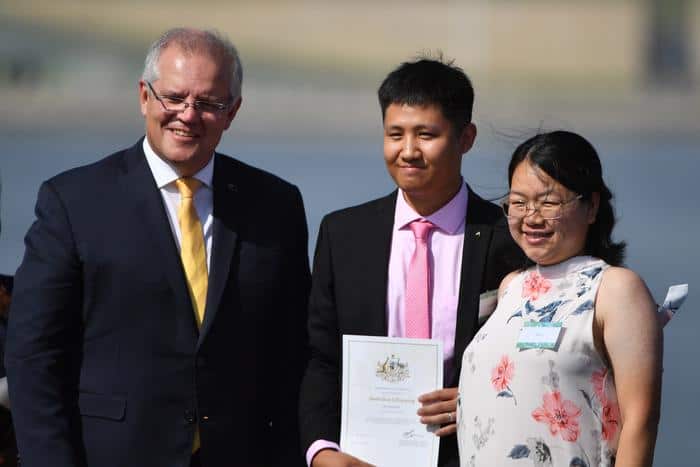 Prime Minister Scott Morrison with new Australian citizens at ceremony in Canberra in January. 
