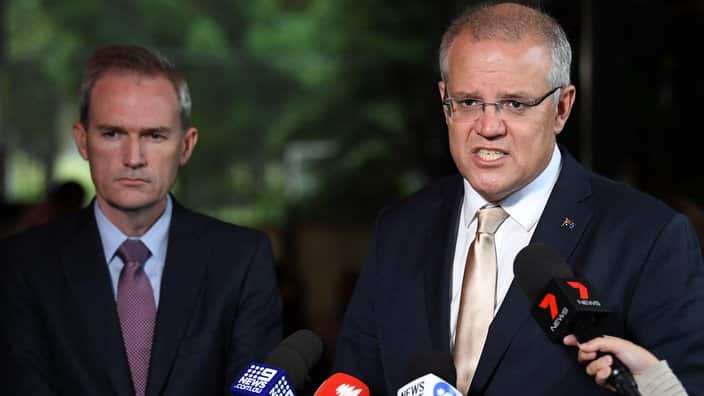 Immigration Minister David Coleman (left) and Prime Minister Scott Morrison