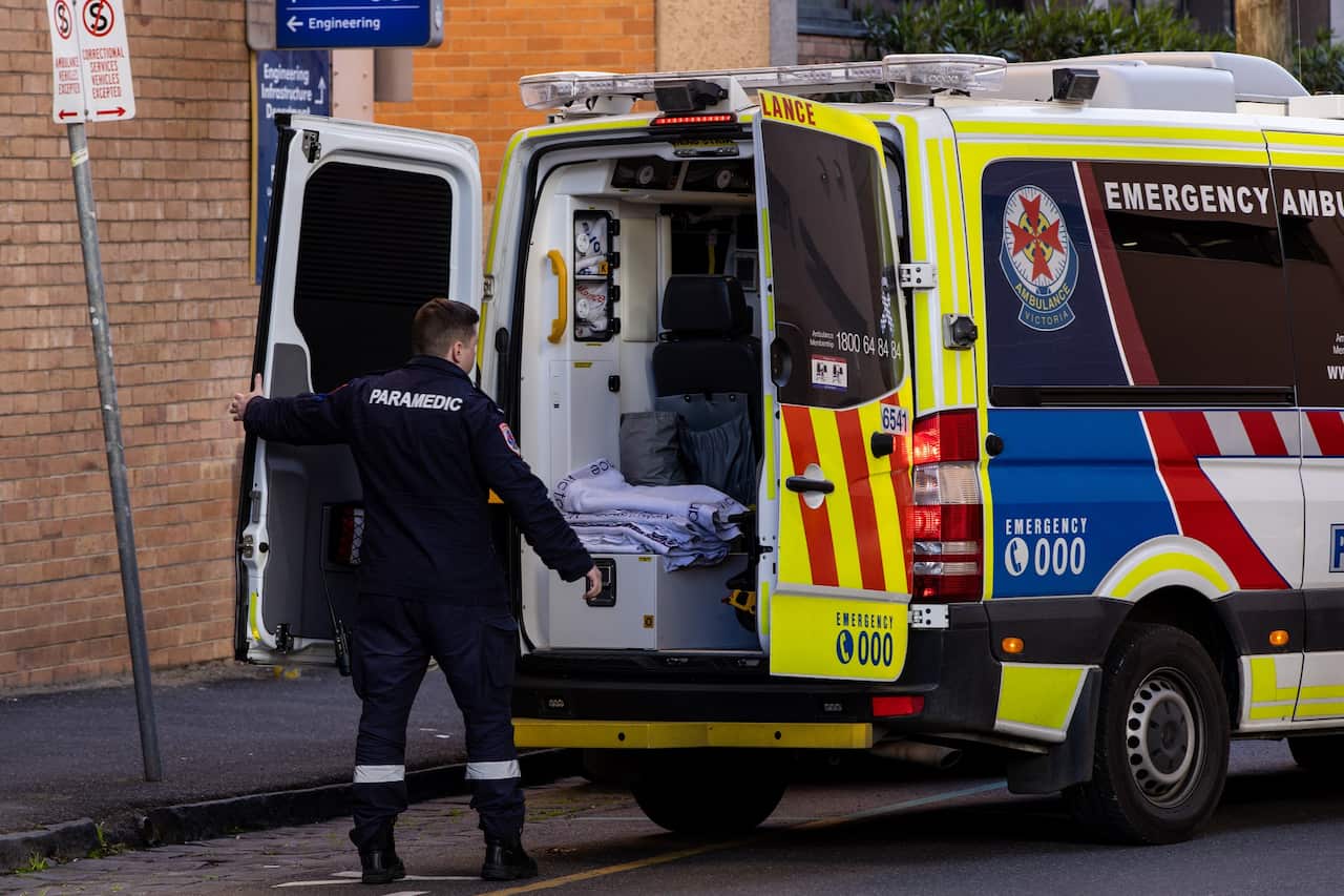 A paramedic is seen at a hospital in Melbourne, Wednesday, July 6, 2022. 