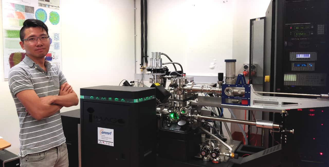 Dr Yi-Sheng Chen with the Atom Probe Tomography, key equipment that will enable his research.