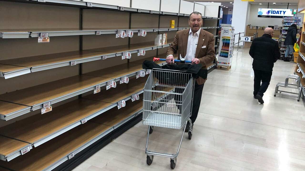 Empty shelves at supermarket as people stockpile due to the fear of the new coronavirus, in Pioltello near Milan, Italy, 24 February 2020. 