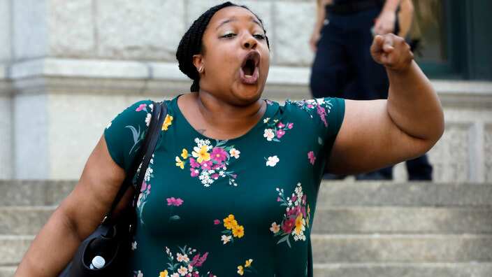 Emerald Garner, daughter of Eric Garner, is angry as she leaves the US Attorney's office