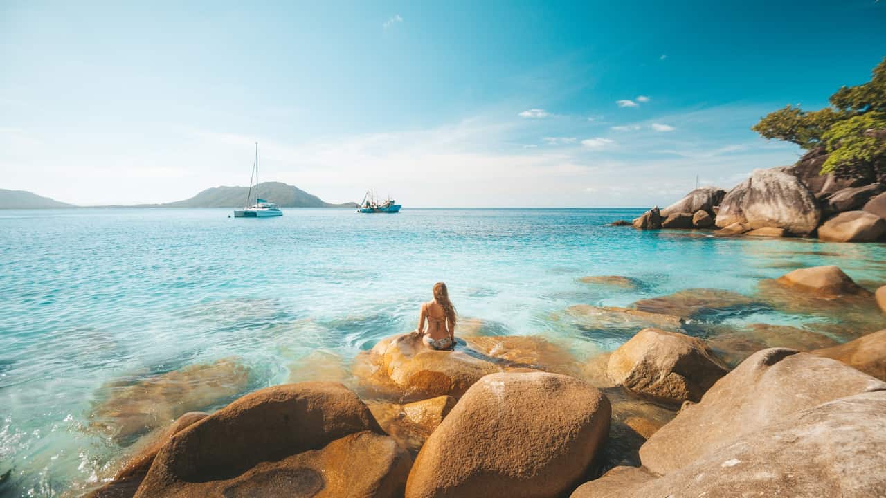 tourist at beach setting in Fitzroy Island off the coast of Cairns