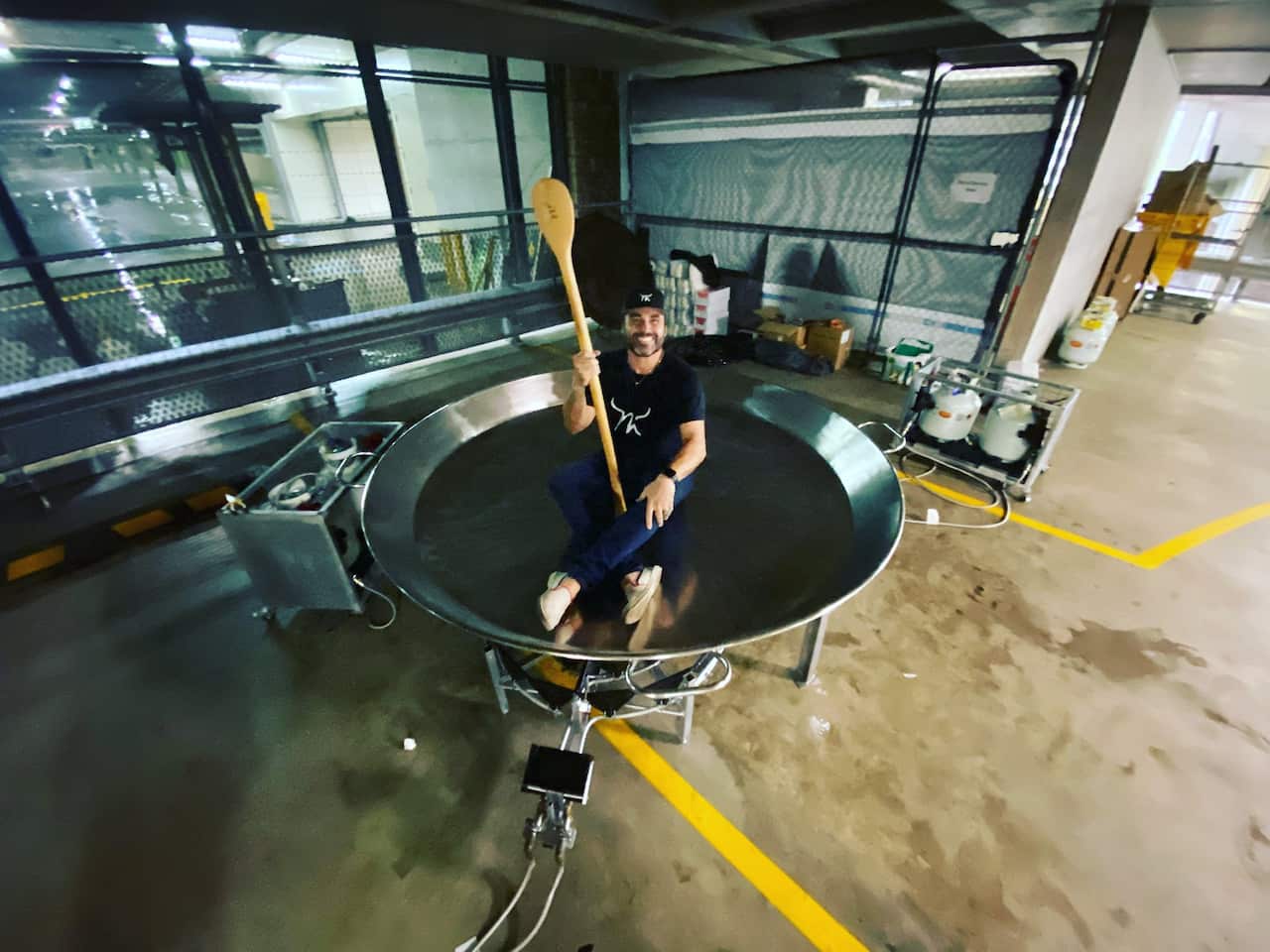 Chef Miguel Maestre with the giant paella pan