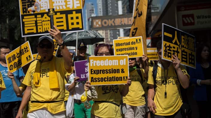Several hundreds pro-democracy activists marched against a proposal to ban the pro-independence Hong Kong National Party.