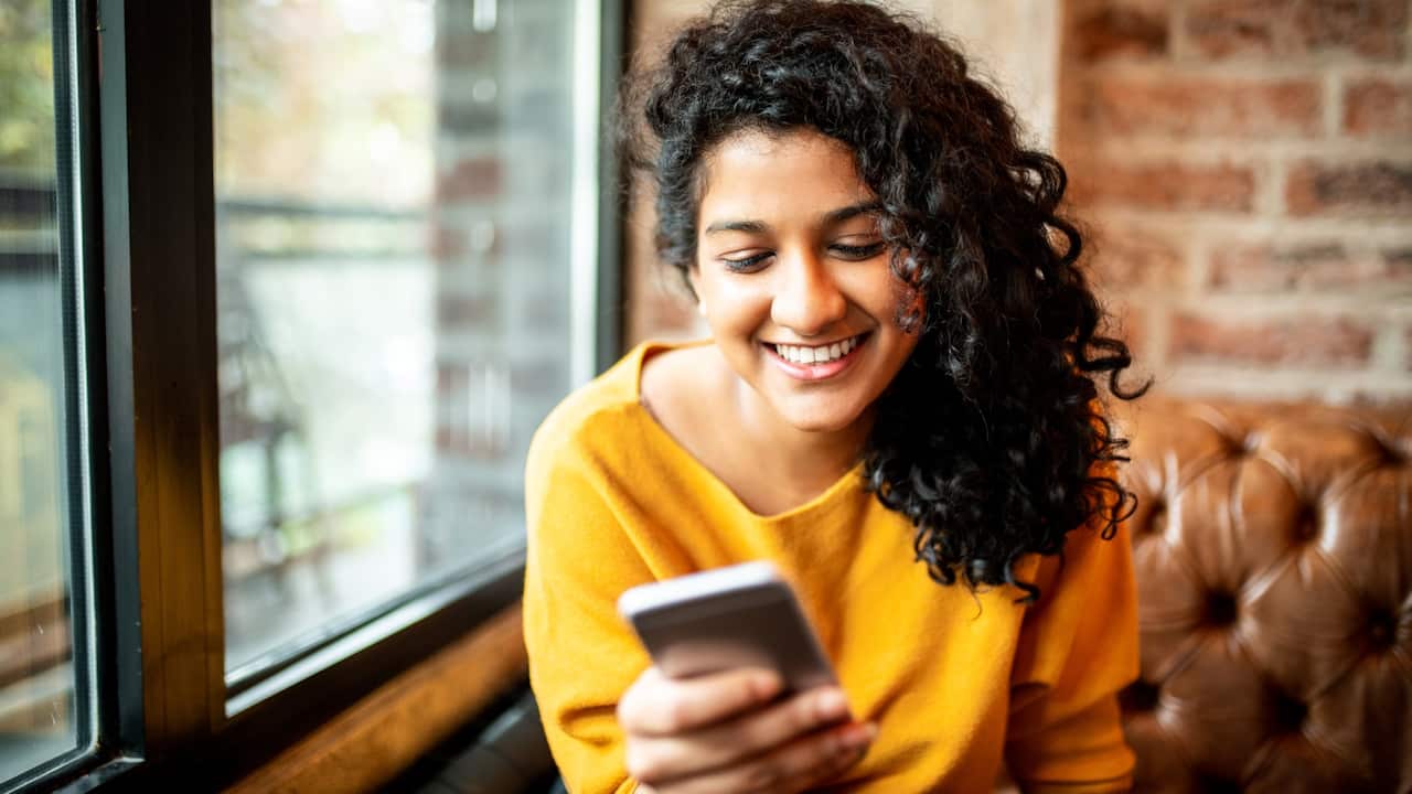 Woman Using Mobile Phone