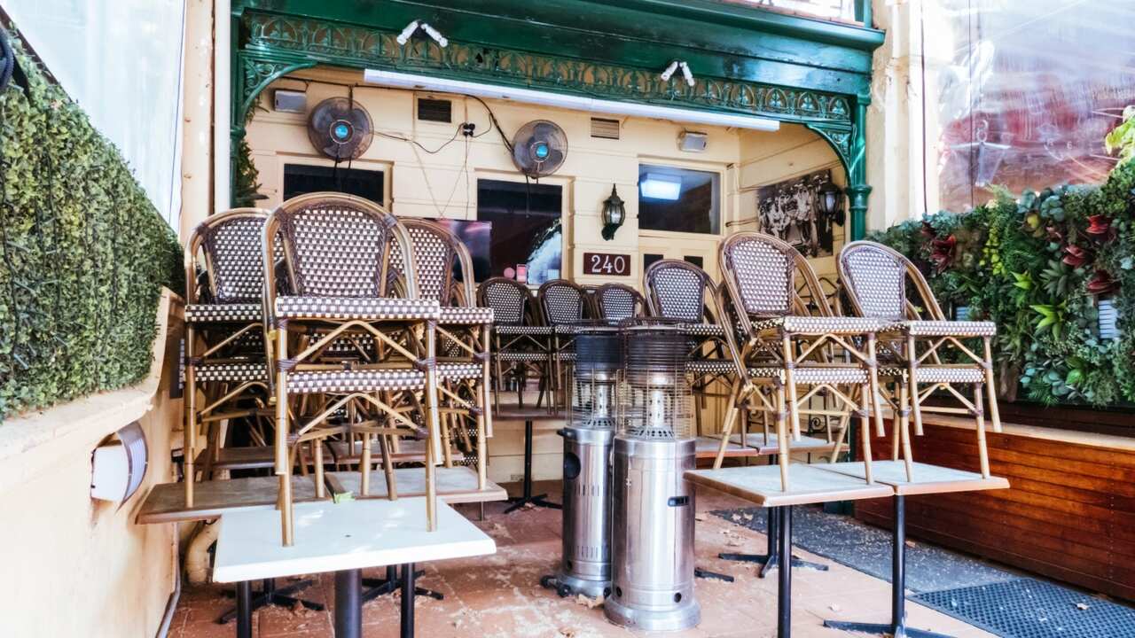 MELBOURNE, AUSTRALIA - OCTOBER 10th 2020: Lygon St restaurants are closed and packed up empty during the Coronavirus pandemic and associated lockdown.