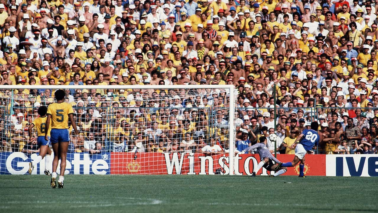 Paolo Rossi of Italy scores the opening goal during the World Cup Spain 1982 match between Italy and Brazil at Estadio de Sarrià on June 5, 1982 in Barcelona , Spain.
