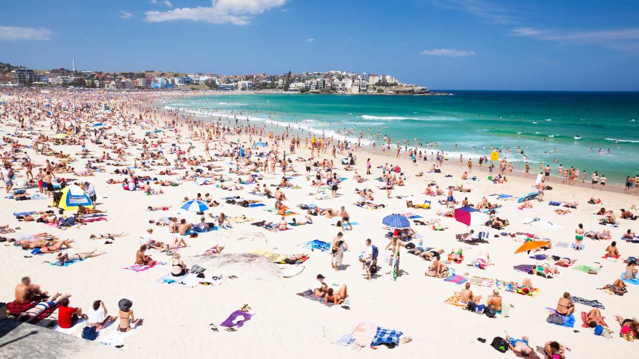 A crowded Bondi Beach, in NSW, on a Summer day.