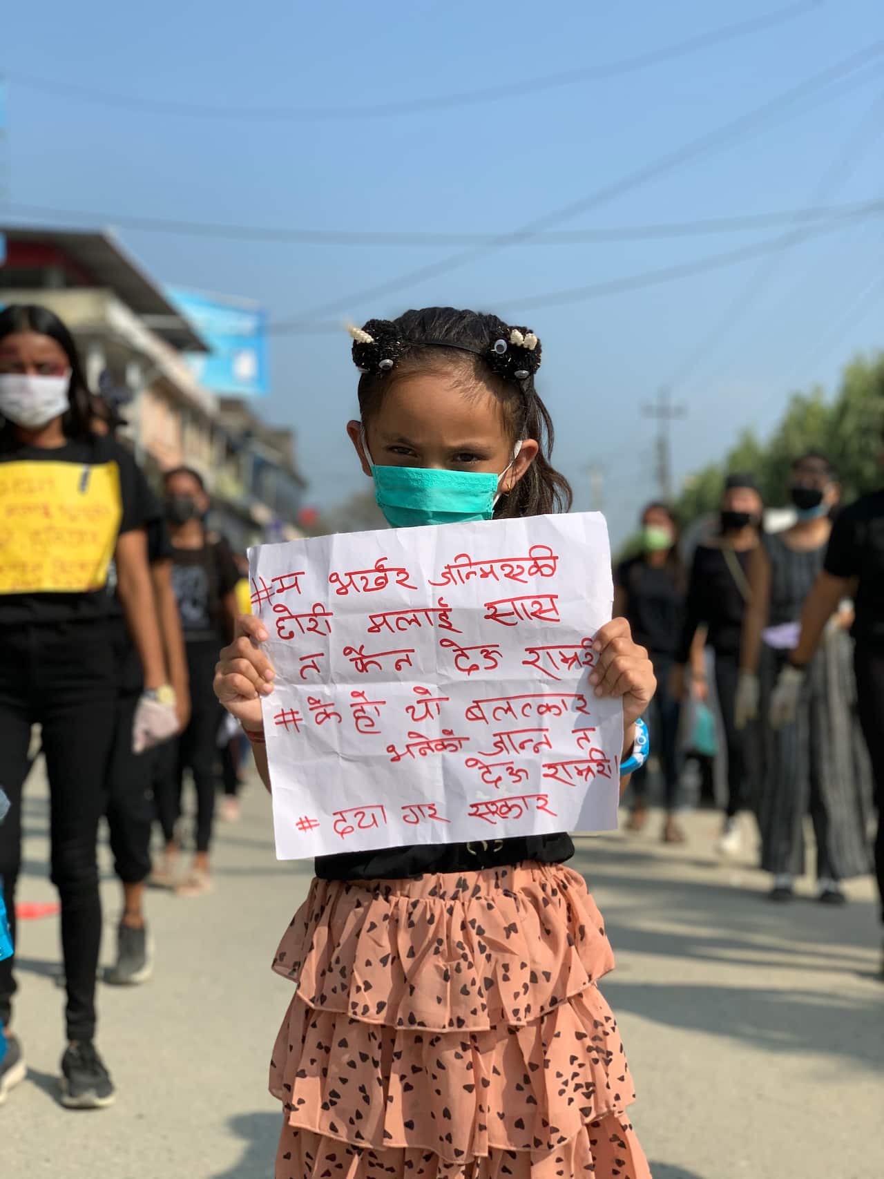 Young girl protesting against rape in nepal.