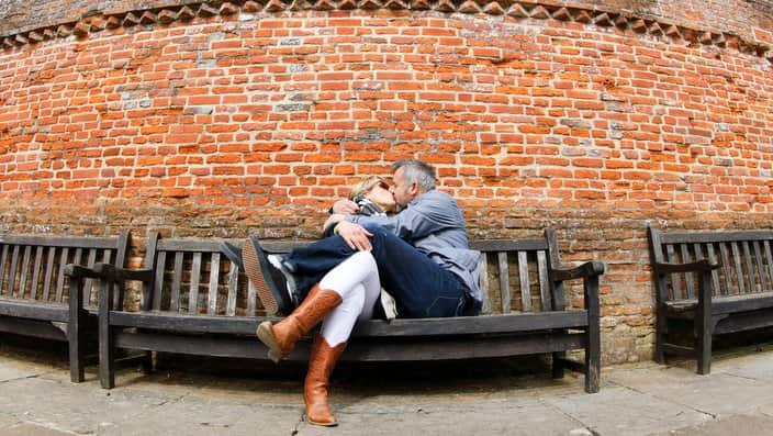 Passionate kiss on bench