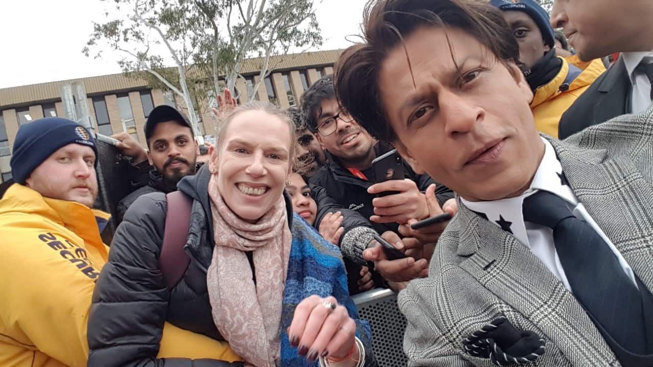 Jessica Ellem (centre) with Bollywood actor Shah Rukh Khan at La Trobe university, Victoria.