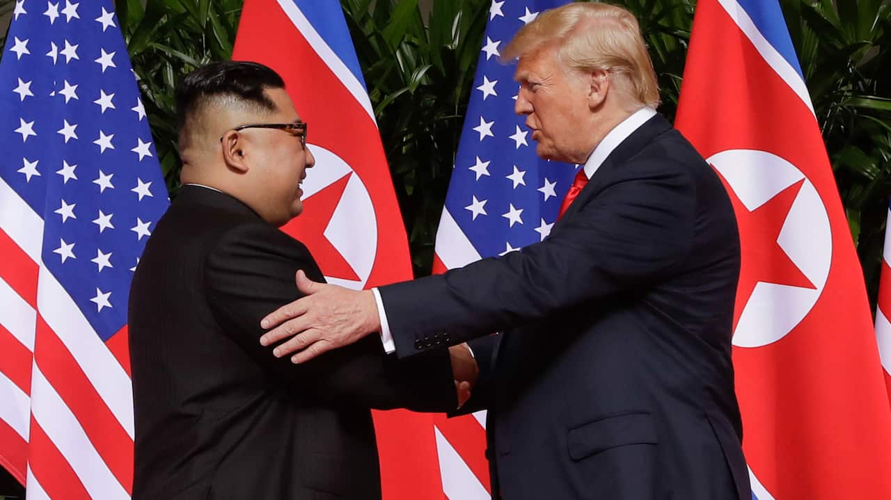 U. S. President Donald Trump shakes hands with North Korea leader Kim Jong Un at the Capella resort on Sentosa Island Tuesday, June 12, 2018 in Singapore. (AP Photo/Evan Vucci)