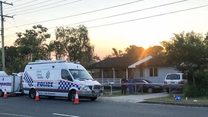 Police forensics examine a vehicle outside a property in Logan, south of Brisbane, Saturday, November 23, 2019. A crime scene has been declared after two children were found dead inside a car.