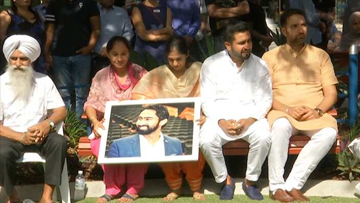 Family and friends of Manmeet Alisher at his memorial - File photo.