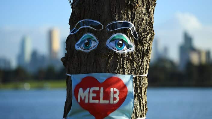 Coronavirus inspired art is seen attached to a tree near Albert Park in Melbourne, Wednesday, August 5, 2020.