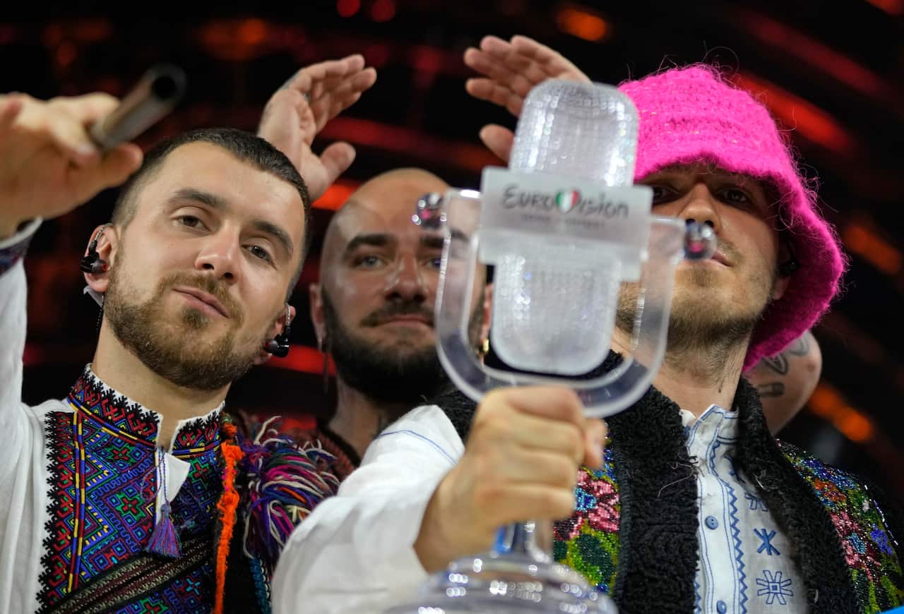 Members of the Kalush Orchestra from Ukraine celebrate after winning the Grand Final of the Eurovision Song Contest at Palaolimpico arena, in Turin, Italy, Saturday, May 14, 2022. (AP Photo/Luca Bruno)