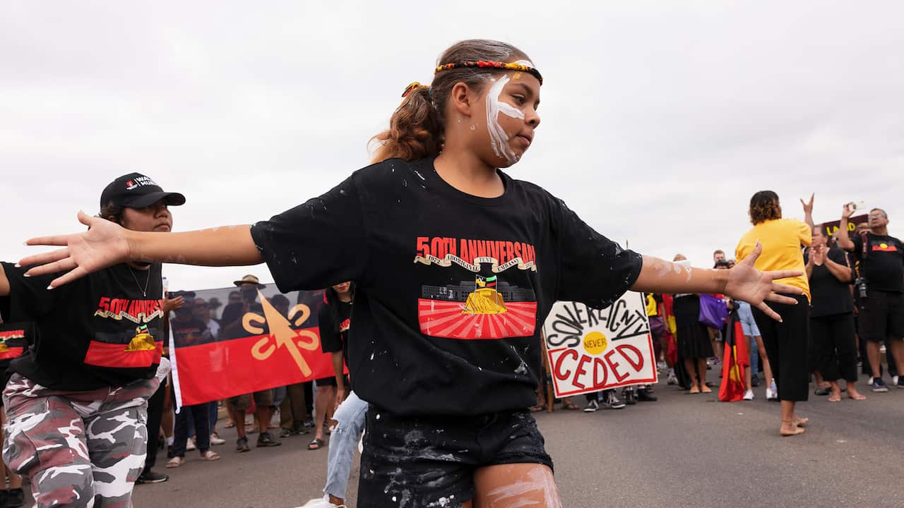 Protestors dance on Commonwealth Avenue on January 26, 2022 in Canberra, Australia