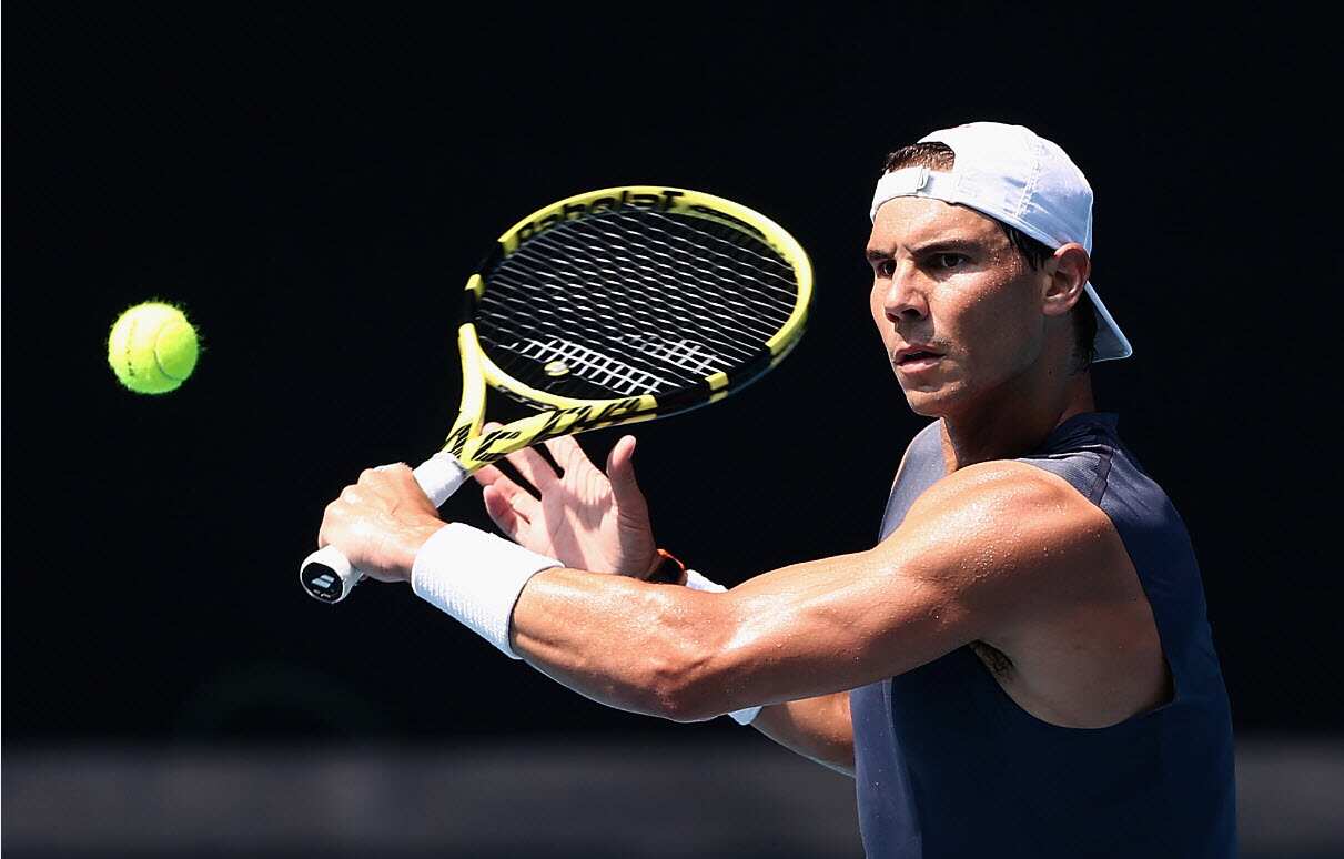 Rafael Nadal of Spain plays a backhand during an Australian Open practice session at Melbourne Park in Melbourne. 