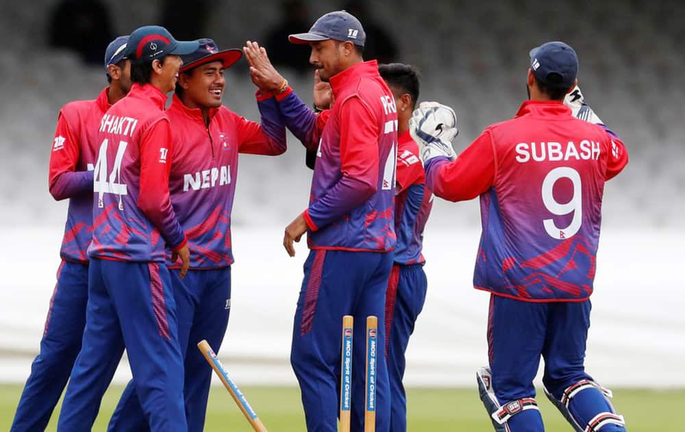 Nepali cricket team celebrating after its first ever one day international victory against Netherlands on Aug 2018.
