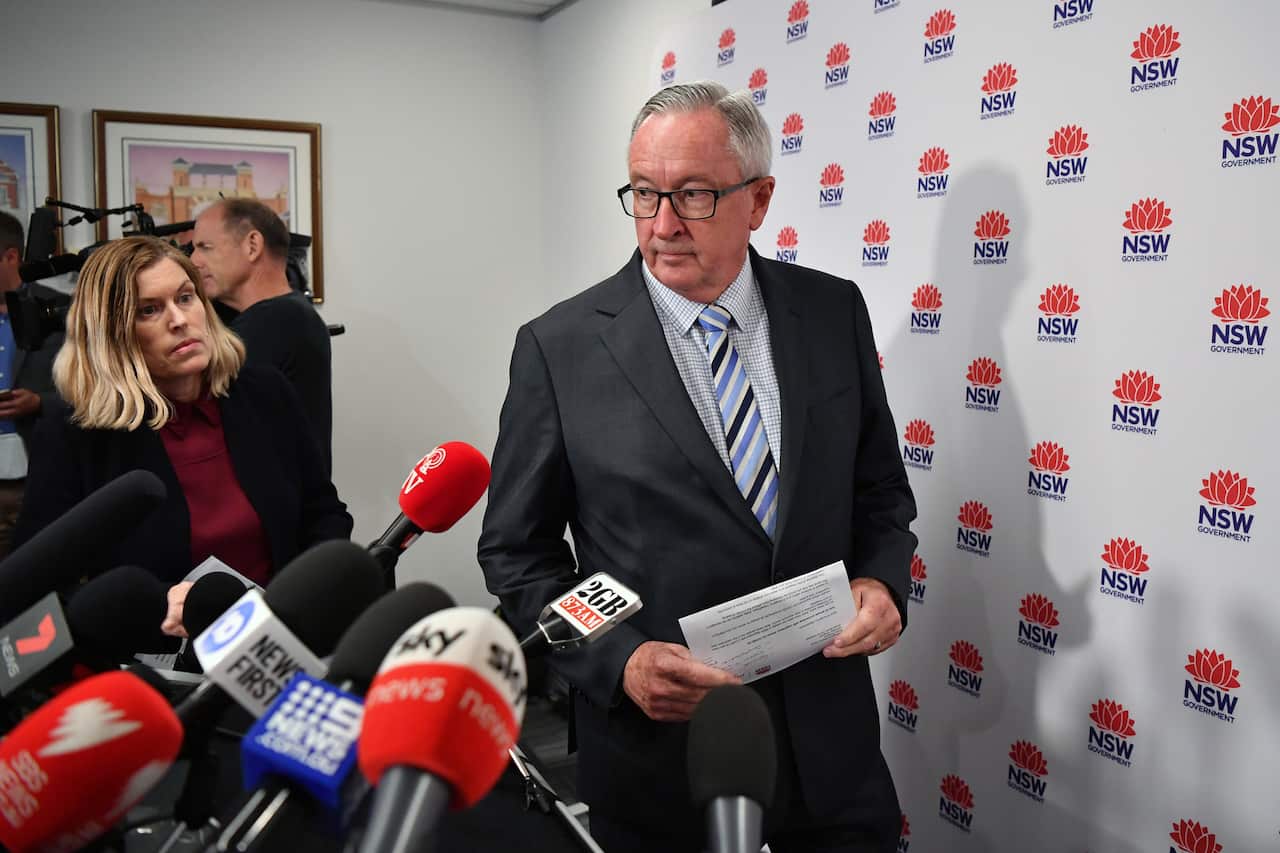 Health Minister Brad Hazzard (right) and NSW Chief Health Officer Dr Kerry Chant arrive to speak to the media in Sydney, Wednesday, March 4, 2020. (AAP Image/Joel Carrett) NO ARCHIVING