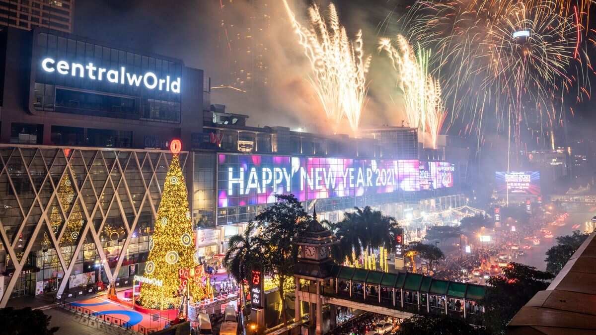 Firework display to celebrate New Year at Central World Department Store, one of the popular countdown spots in downtown Bangkok, Thailand.