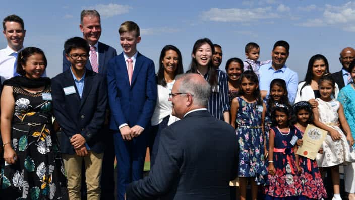 PM Scott Morrison with newly sworn in citizens at an Australia Day ceremony