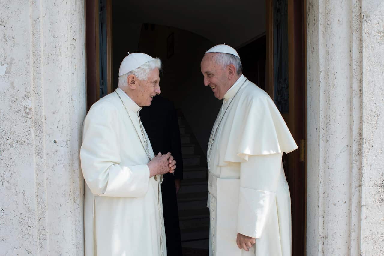 Pope Francis (R) meeting Pope Emeritus Benedict XVI at Vatican City in 2015