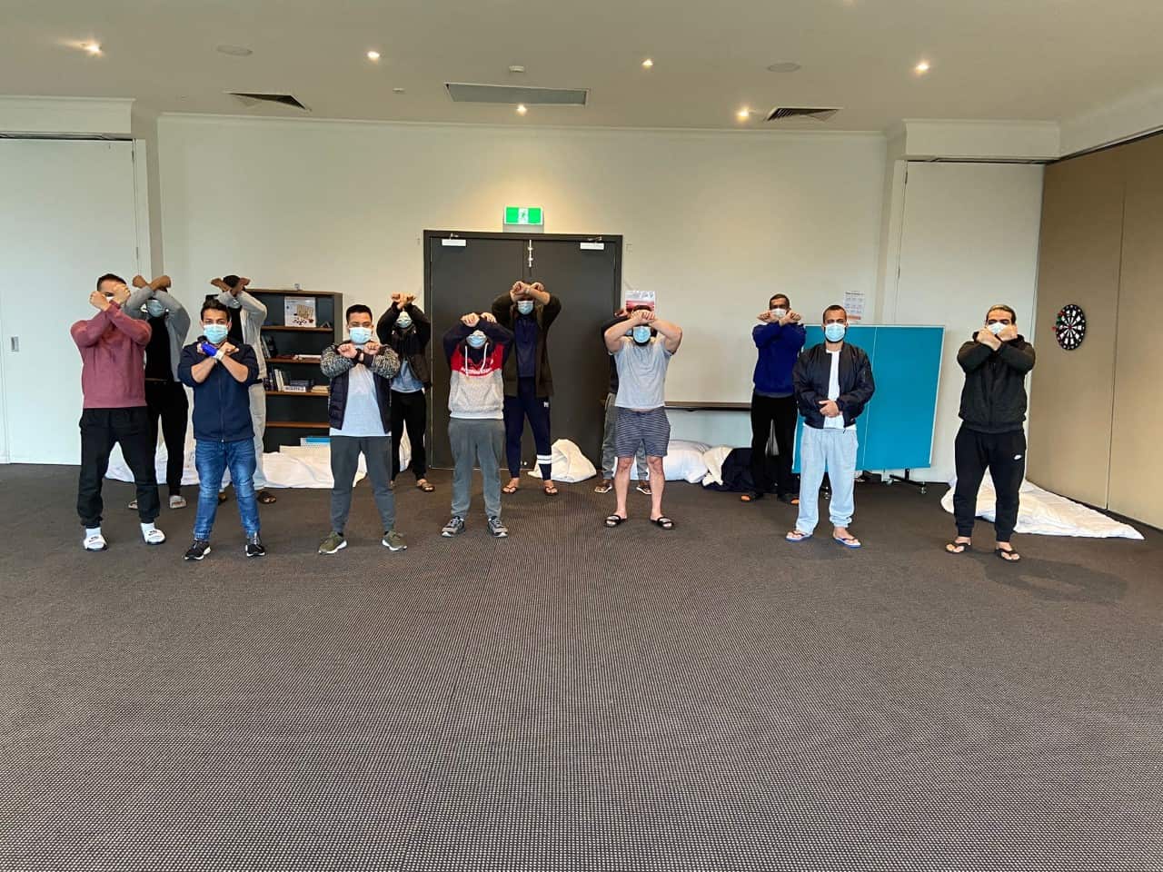 Asylum seekers and refugees protesting their conditions at the Park Hotel in Melbourne. 