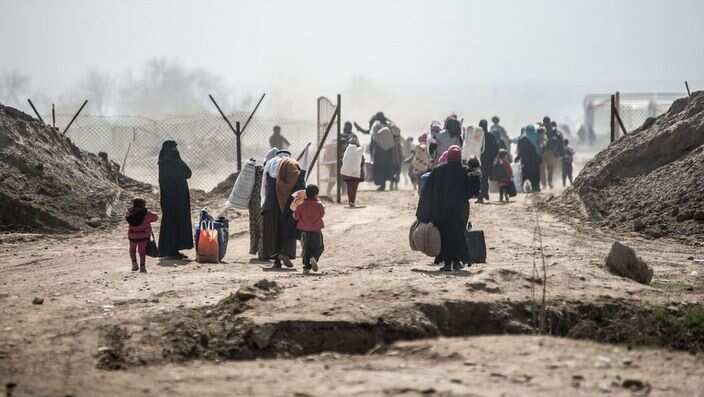 Residents fleeing a national disaster