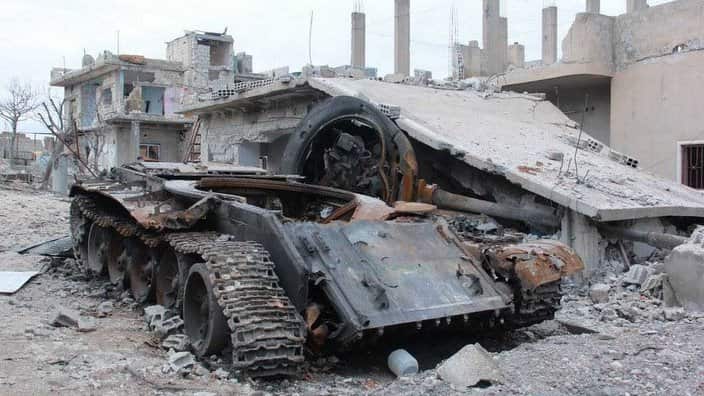 damaged tank in Kobani