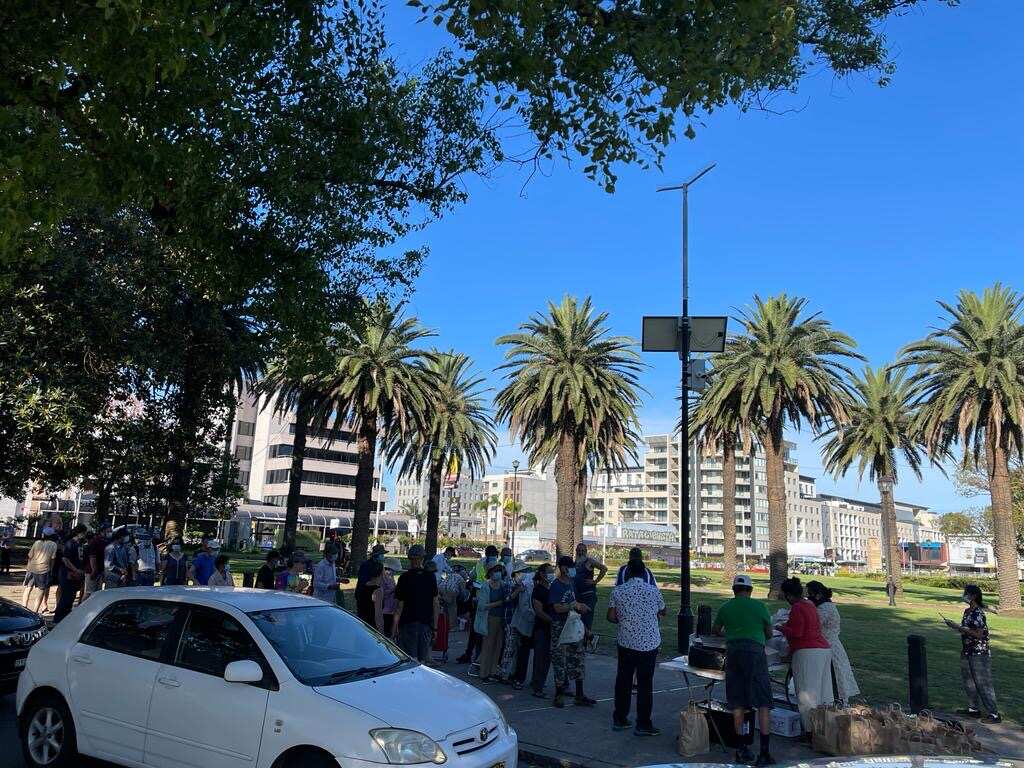 Language barrier prevents charity from understanding increase in elderly Asians queueing for food handouts.