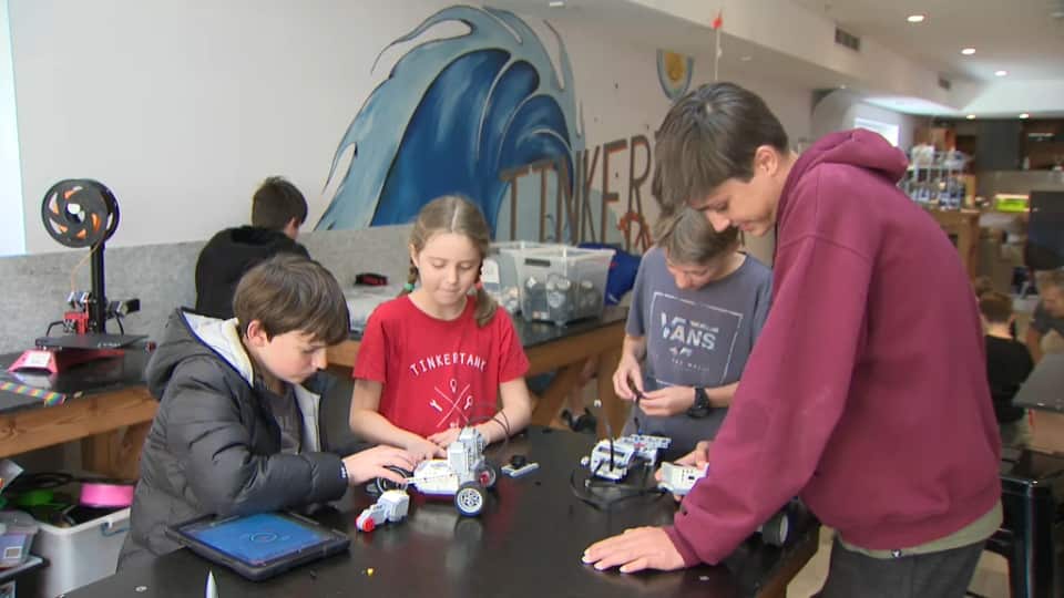 Students enjoying STEM learning at a school holiday program