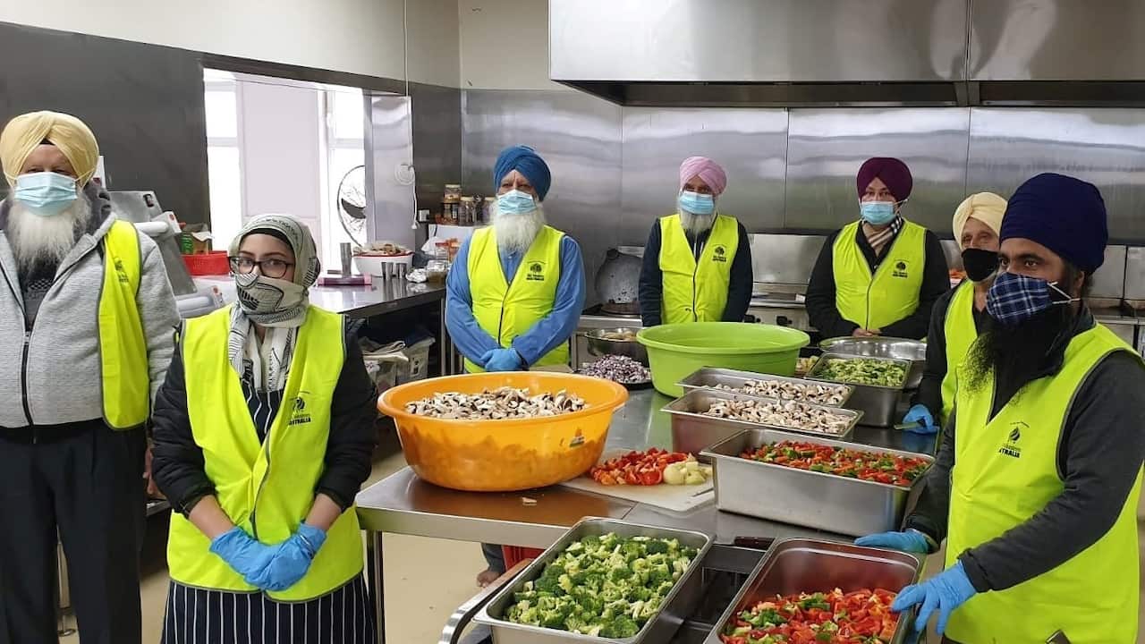 A team of Sikh volunteers preparing meals at a community kitchen in Melbourne's south-east.