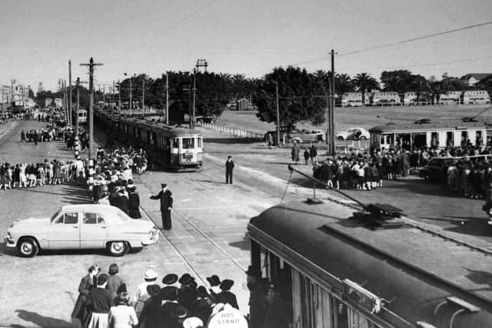 No 85 Coupled O & P class trams pick up hordes of passengers after an event at the Moore Park Showground.