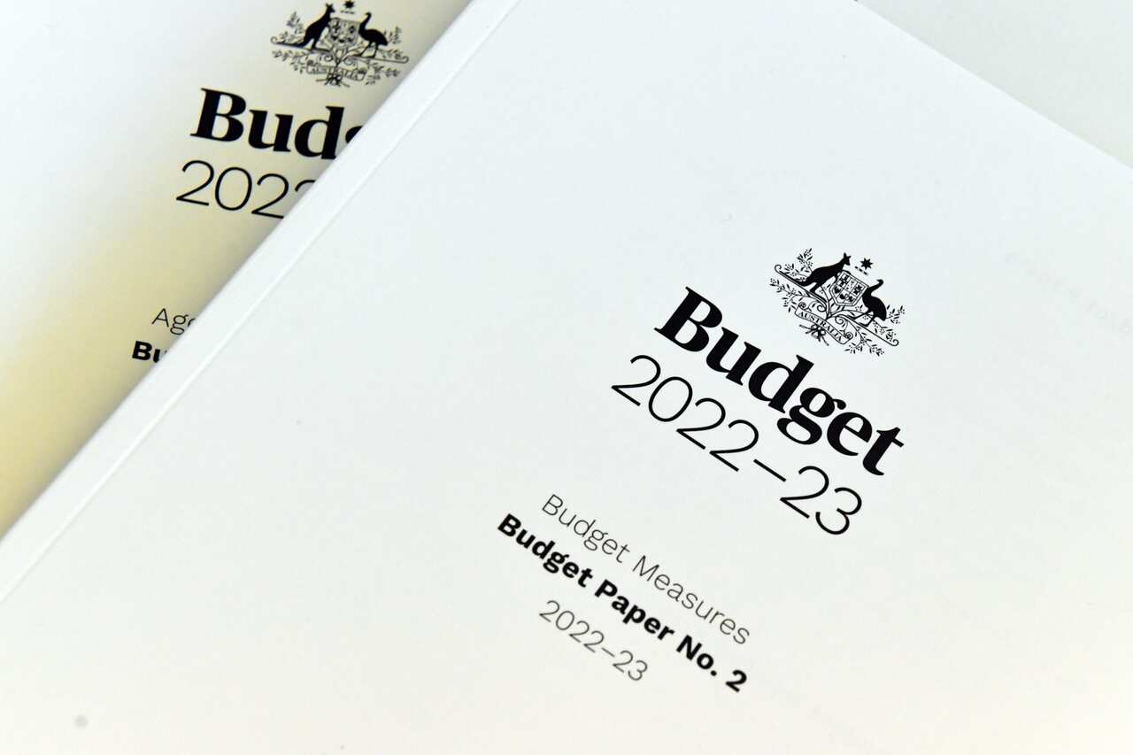 The 2022-2023 Budget books are seen at Parliament House in Canberra, Tuesday, March 29, 2022. Treasurer Josh Fydenberg will today hand down the 2022/23 federal budget. (AAP Image/Mick Tsikas) NO ARCHIVING