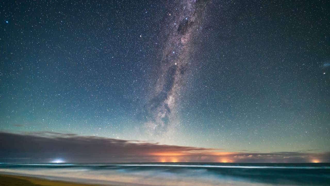 The Dark Emu of Aboriginal sky lore rising in a moonlit sky over the Tasman Sea from a beach near Lakes Entrance, Victoria, Australia, April 2, 2017