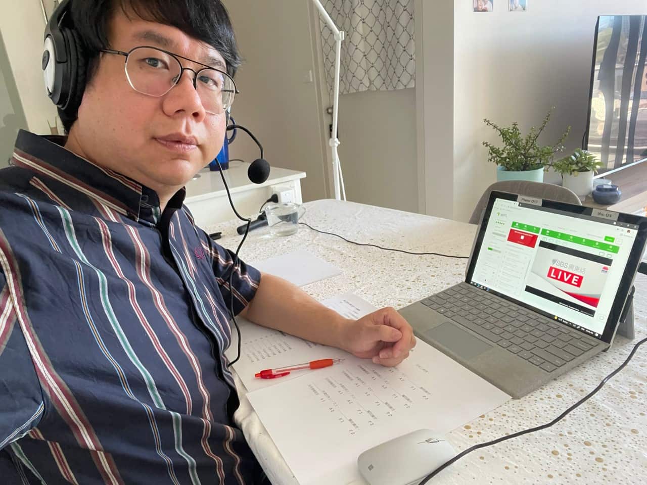 Nelson Lo is one of two simultaneous interpreters doing live interpreting of NSW COVID daily briefing for SBS Cantonese program