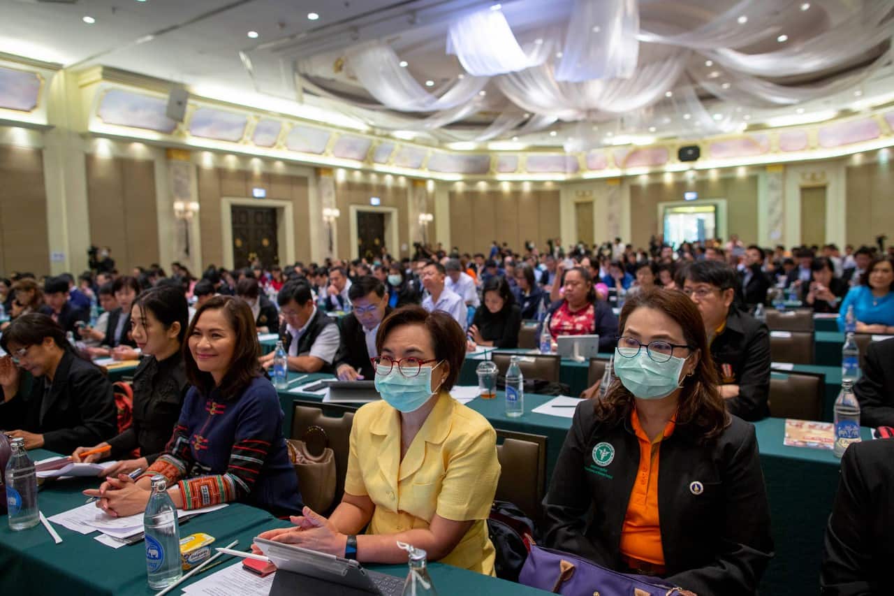 Public health officials participate in a preparation meeting for coronavirus