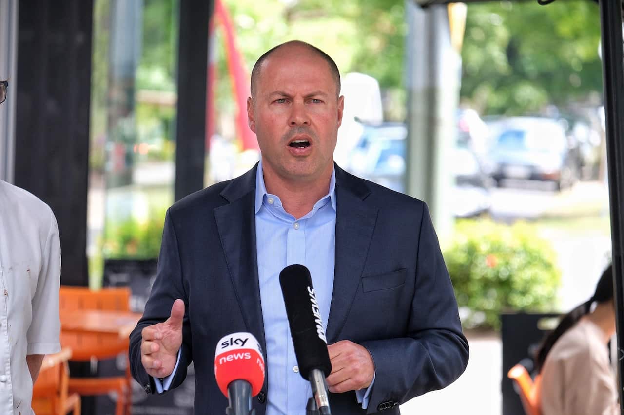 Treasurer Josh Frydenberg gives a media conference outside Zimt Bakery in Surrey Hills, Melbourne, Monday 18, January, 2021. (AAP Image/Luis Ascui) NO ARCHIVING
