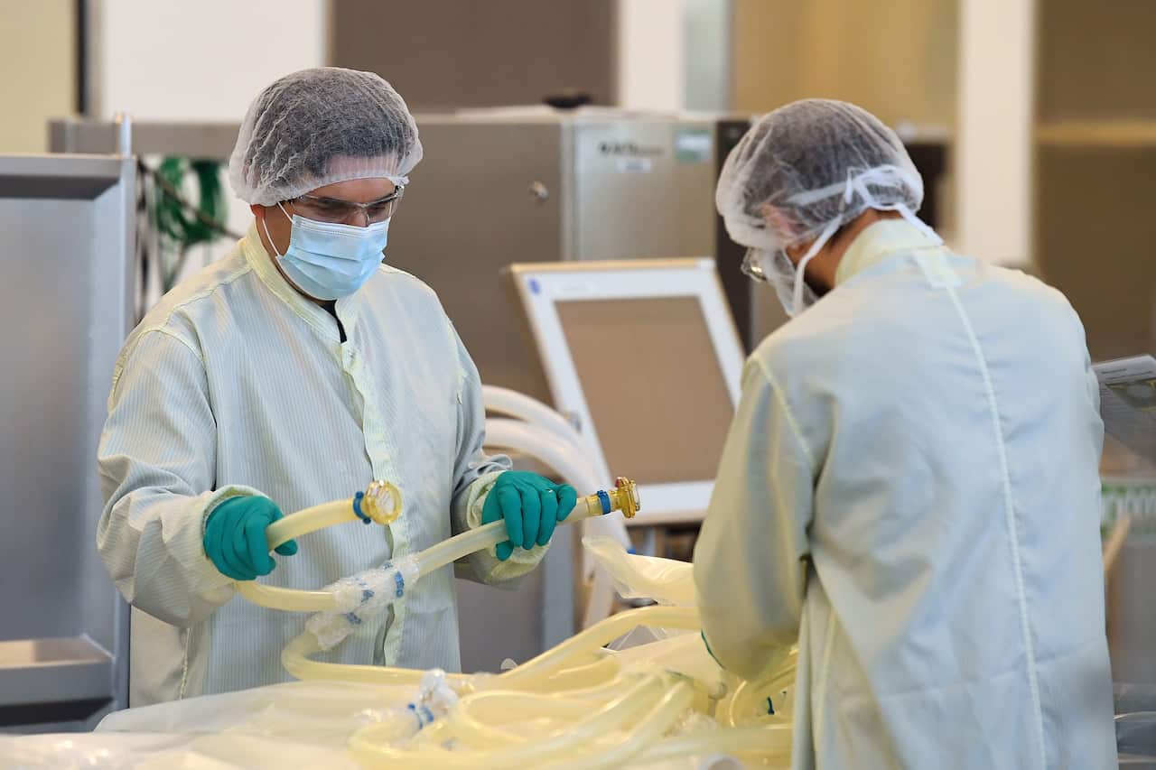 Scientists are seen at work inside of the CSL Biotech facility in Melbourne