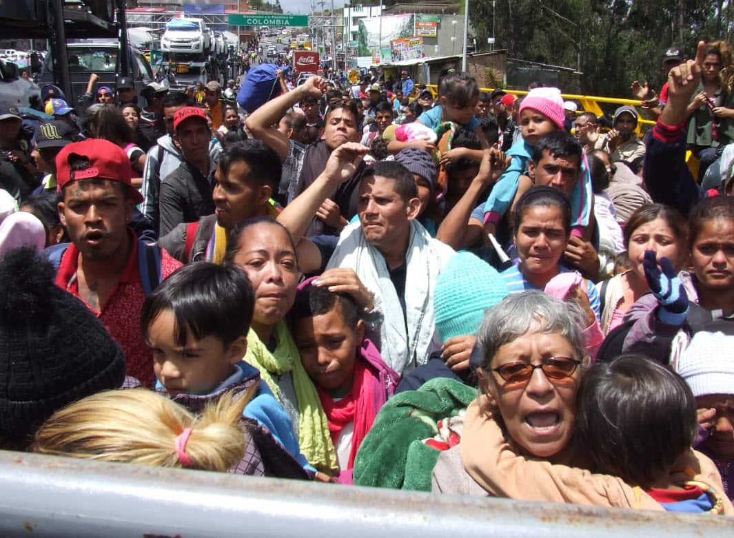 Venezuelan migrants at the border between Colombia and Ecuador