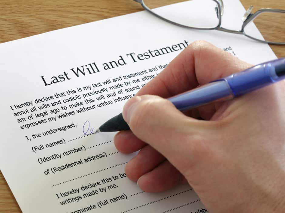 Signing Last Will and Testament document