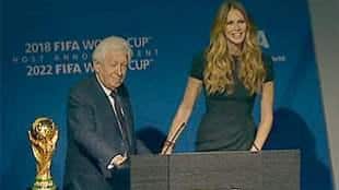 Frank Lowy, here with super model Elle Macpherson, has been "fantastic for football in Australia', says SBS football chief Les Murray