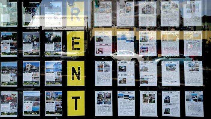 Houses for sale and lease are advertised in the window of a real estate agent at Bondi in Sydney, Friday, April 24, 2009
