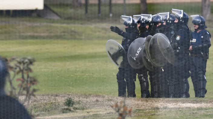 Riot Police are seen during a riot at the Frank Baxter Juvenile Justice Centre, Kariong
