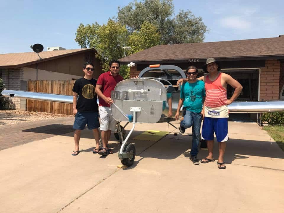 Pramod Regmi with his few friends and his aircraft