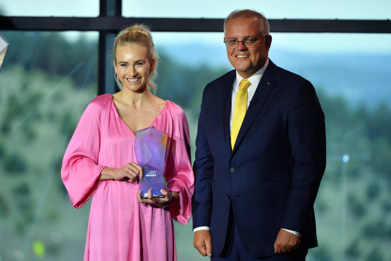 Prime Minister Scott Morrison with 2021 Young Australian of the Year winner Isobel Marshall during the 2021 Australian of the Year Awards at the National Arboretum in Canberra, Monday, January 25, 2021.